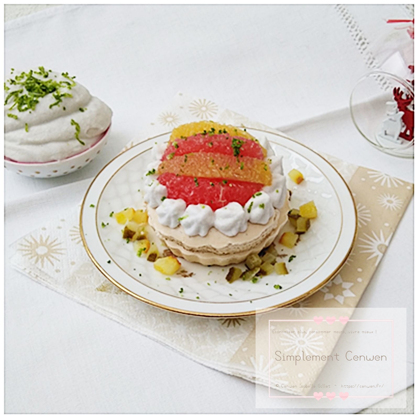 Pavlova garnie de crème et d’agrumes frais.