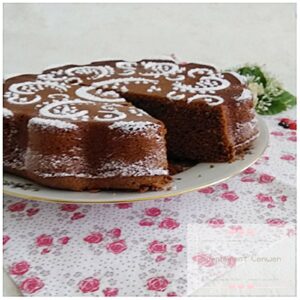 Gâteau au chocolat de Nancy, fondant et légèrement craquelé, servi en parts.